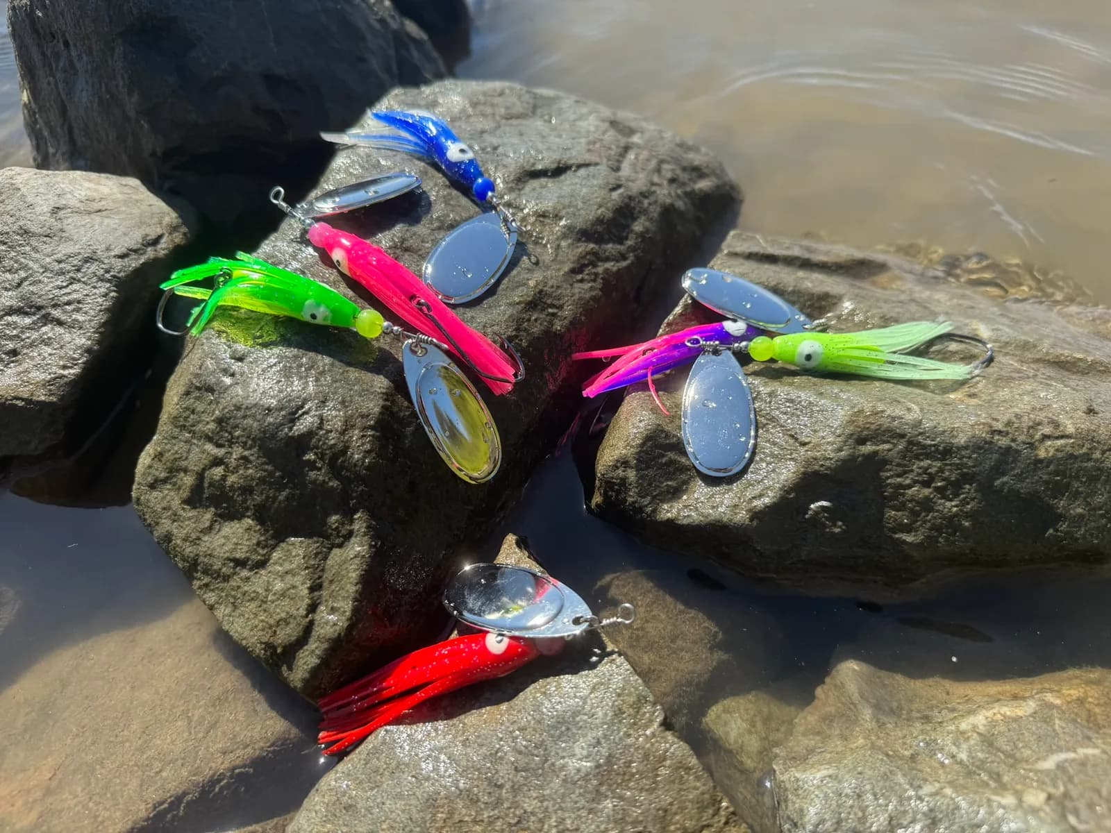 SRT salmon spinner color lineup — Pink, Green, Blue/White, Purple/Pink, Chartreuse, and Red